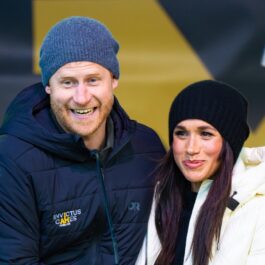 Meghan Markle și Prințul Harry la un eveniment sportiv